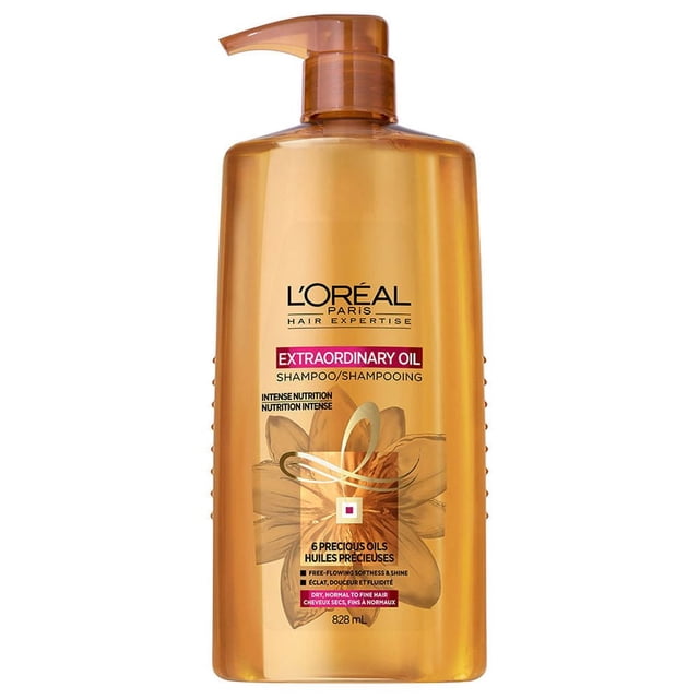 L'Oreal Paris Extraordinary Oil Shampoo for dry hair in an 828 mL amber pump bottle with 6 precious oils to nourish and smooth dry, normal to fine hair, offering intense nutrition and softening benefits.