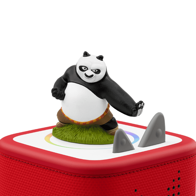 tonies Kung Fu Panda Audio Play Figurine showing Po in a kung fu pose on a green base, placed on a red Toniebox speaker with textured fabric and control ears visible, ideal for screen-free educational play.