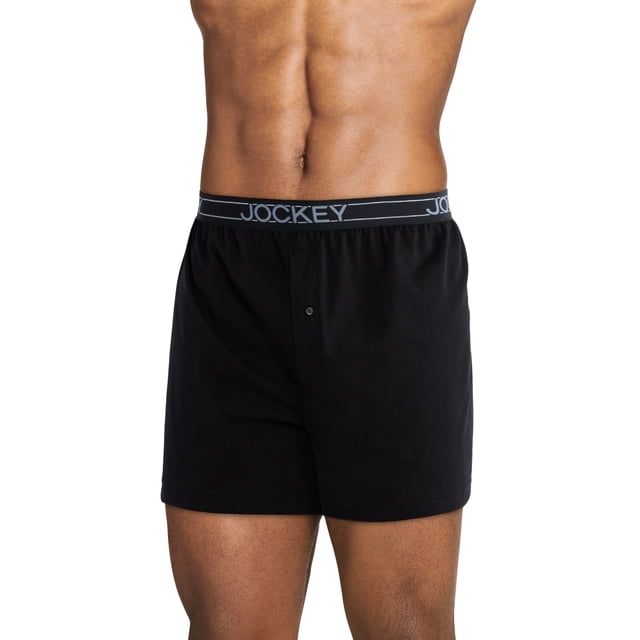 Jockey Boxeur pour Hommes ActiveBlend en Tricot 5 Pouces Noir, Conçu pour le Confort avec une Coupe Taille Basse, une Couverture Complète et une Fermeture à Braguette Boutonnée. Fabriqué à Partir d'Un Mélange Évacuant l'Humidité de 60 % Coton et 40 % polyester, Ces Boxeurs Sans Étiquette Offrent un Entrejambe de 5 Pouces et une Technologie StayNew pour une Fraîcheur Durable. sous-Vêtements pour Hommes Idéaux avec une Ceinture Jockey à logo.