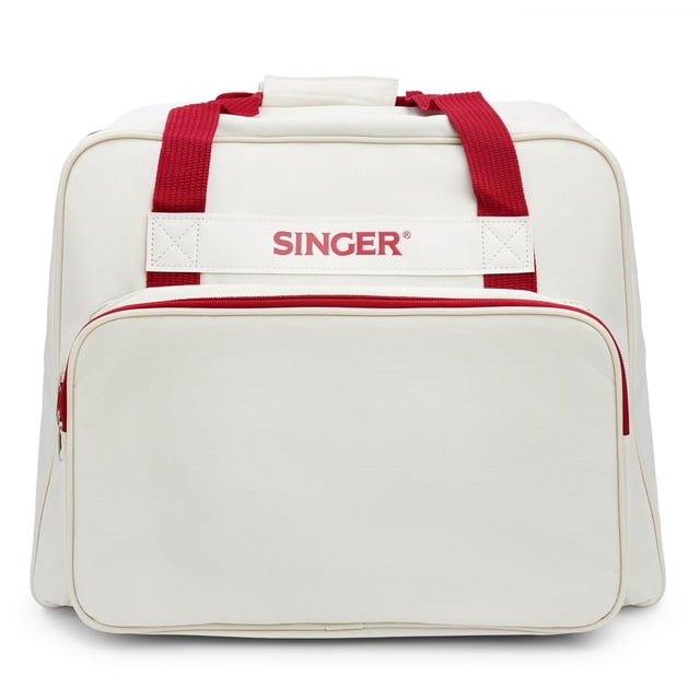 SINGER® Universal Canvas Tote Bag in cream canvas with padded red webbing handles and red zipper accents, featuring a full-zip main compartment and large front pocket for sewing machine accessories, suitable for protective storage and transport of sewing machines and kits.