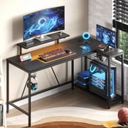 Bestier L Bureau de jeu en forme avec LED Lumières & Power Outlets, 58'' Bureau de coin d'ordinateur réversible avec étagères, poste de travail de bureau noir en fibre de carbone avec support de moniteur & Crochet pour casque