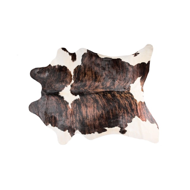 H-Natural Kobe Cowhide 6'X7' Rug laid flat with natural irregular edges, featuring dark brown and white patches, soft low pile texture, and supple sheen. Durable, stain-resistant, and ideal for high-traffic indoor areas adding warmth and style.