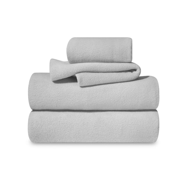 Northern Comfort Ensemble de Draps en Micropolaire Super Douillet en Gris Pâle, Doté d'Un Tissu en Micropolaire Doux avec Drap-Housse, Drap Plat et Taies d'Oreiller Bien Pliés, Conçu pour Ajouter Chaleur et Confort à Tout Cadre de Chambre, Convient Aussi à la Literie de Détente Douillette.