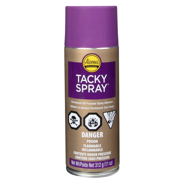 Aleene's Crystal Clear Tacky Spray Adhesive, 11 oz aerosol can with purple cap and label, permanent multipurpose spray adhesive that dries clear, ideal for paper, photos, posterboard, and crafts, with hazard warnings for poison, flammability, and pressurized contents.