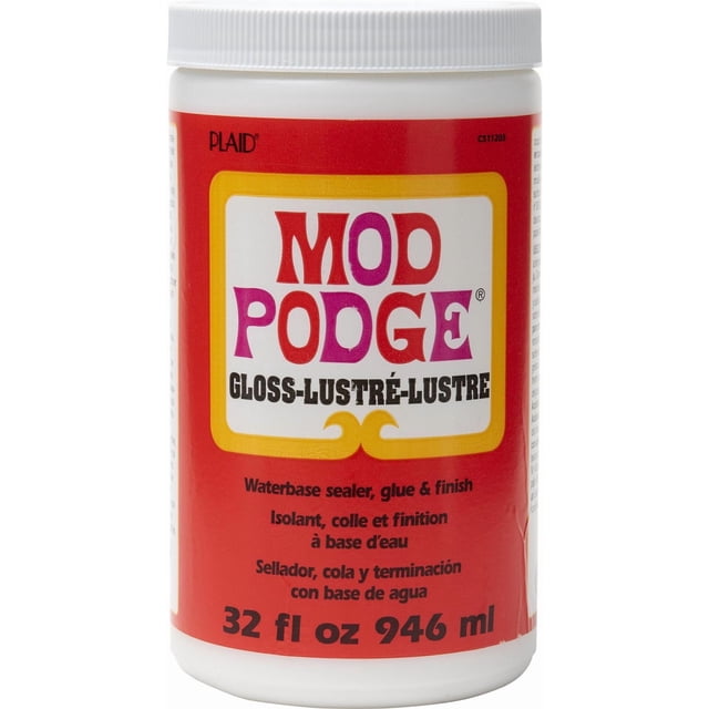 Mod Podge 32 oz Gloss waterbase sealer, glue, and finish in a white plastic jar with a red label and white screw-on lid, featuring bold red and purple text and multilingual product description, ideal for decoupage and craft adhesives projects.