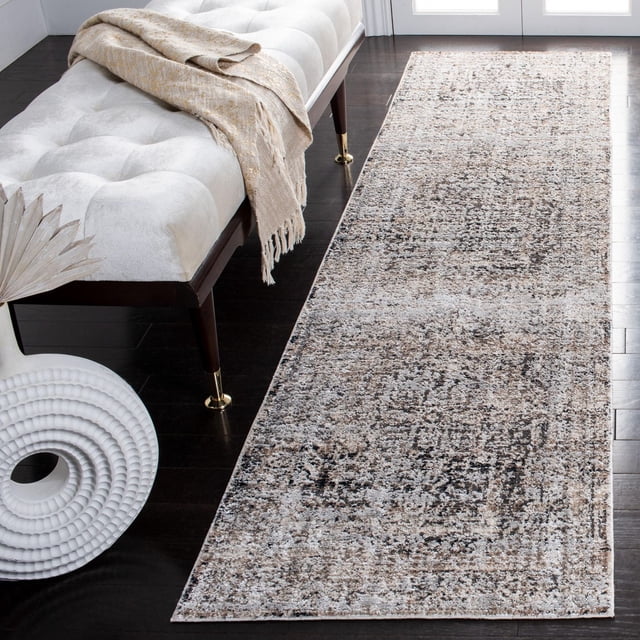 Safavieh Mayflower Charla Traditional Distressed Area Rug 2'2"x9' runner with a distressed vintage pattern in soft neutral beige, gray, and brown tones, power-loomed synthetic yarns with textured pile and petite fringes, placed on dark hardwood floor beside a tufted beige bench with gold-capped legs and a beige throw, suitable for adding classic-contemporary style and durability to accent rug spaces.