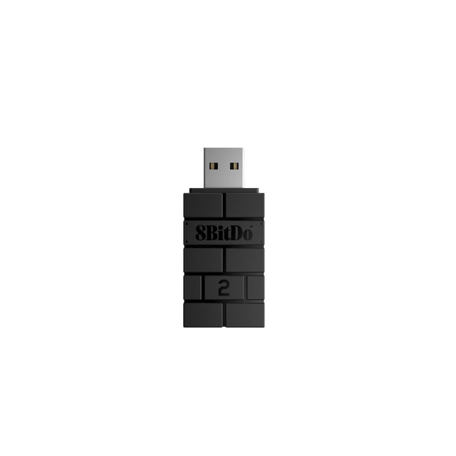 8BitDo USB Wireless Adapter 2 in black, front view showing a compact USB device with a segmented brick-like design and 8BitDo logo, enabling Bluetooth connection of wireless controllers to Switch, Windows, macOS, Steam Deck, and Raspberry Pi, also ideal for customizing controller settings.