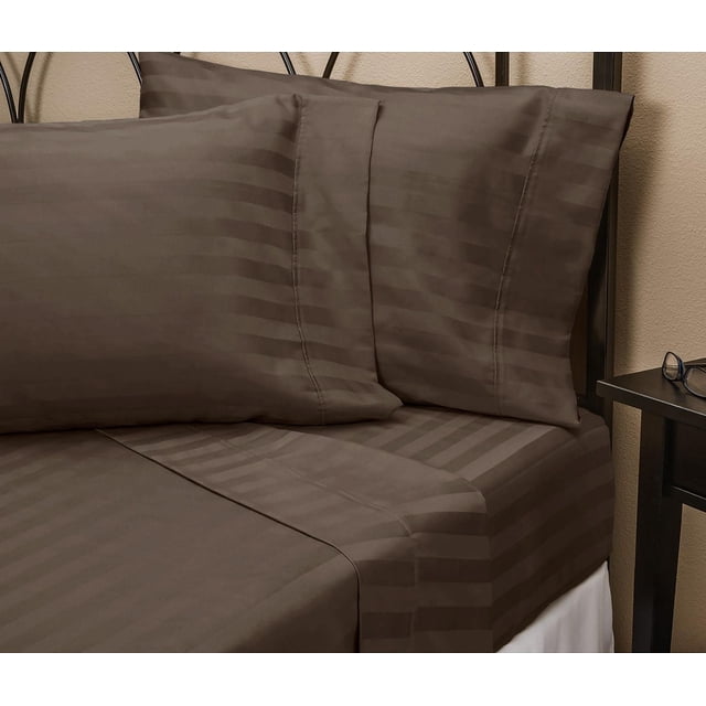 Johnson Home 400 Thread Count Cotton Sheet Set Damask Stripe in brown, showing a close-up of fitted sheet and two pillowcases with subtle horizontal damask stripes, made from breathable 100% cotton fabric on a metal bed frame with a beige wall background, ideal for adding comfort and style to bedrooms.