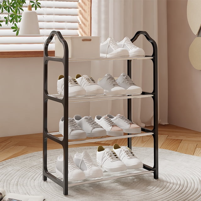 EGNMCR Shoe Rack with 4 tiers of metal shelves, featuring a black polypropylene and steel tube frame. The rack is displayed in a bright room with wooden flooring and a circular rug, holding various pairs of shoes. Ideal for shoe storage in bedrooms, closets, entryways, or dorm rooms. Its space-saving design is also suitable for organizing books or sports equipment.