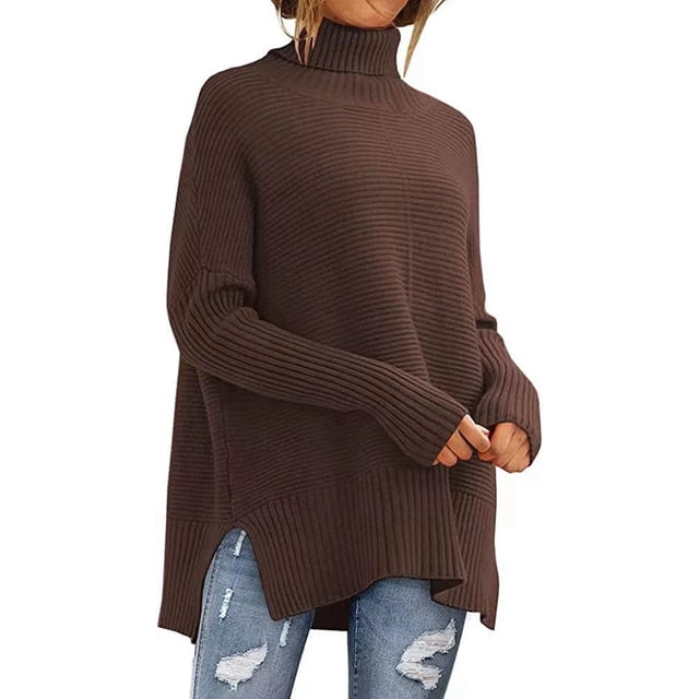 Women’s oversized loose sweater in coffee color, featuring a ribbed texture, batwing sleeves, and a tunic-length design with side vents. Made from a blend of 49.3% viscose, 27.7% polyester, and 23% nylon, this size L sweater offers a relaxed fit with a bust measurement of 116 cm (45.67 inches), sleeve length of 69 cm (27.17 inches), and overall length of 64 cm (25.20 inches). Styled here with distressed jeans, it is ideal for autumn and winter wear.