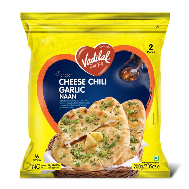 Vadilal Cheese Chili Garlic Naan frozen bread package showing two pieces of tandoori baked leavened naan stuffed with cheese, garnished with green herbs and chili, in a yellow bag with brand logo and nutritional info.