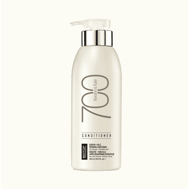 BIOTOP 700 Keratin + Kale Shampoo 500ml bottle featuring a sleek white design with a pump dispenser. Infused with keratin and kale, this hydrating shampoo smooths, softens, and strengthens damaged hair while calming coarse or frizzy hair types.
