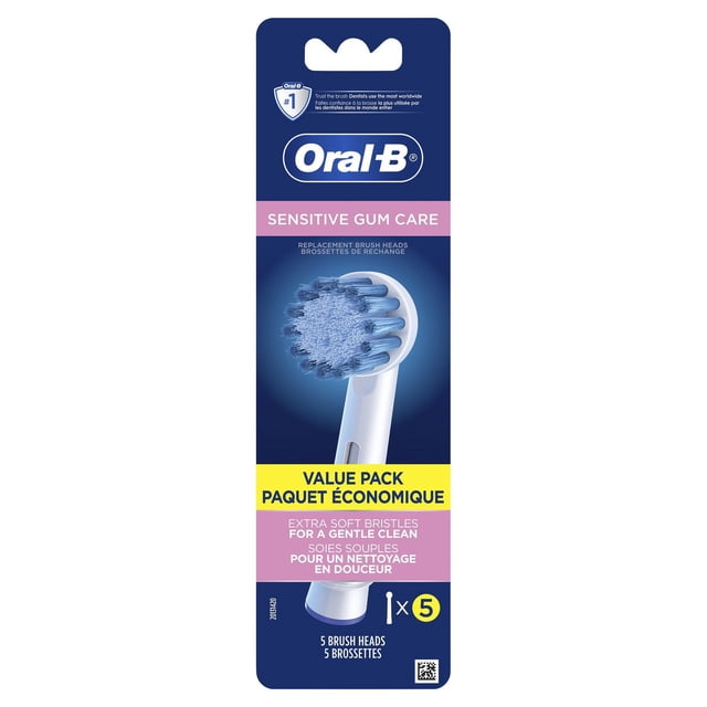 Oral-B Sensitive Gum Care Replacement Brush Heads pack showing a close-up of a round brush head with extra soft blue bristles designed for gentle cleaning and plaque removal on sensitive gums, displayed on blue packaging with bilingual English and French text and a yellow value pack label indicating five brush heads.