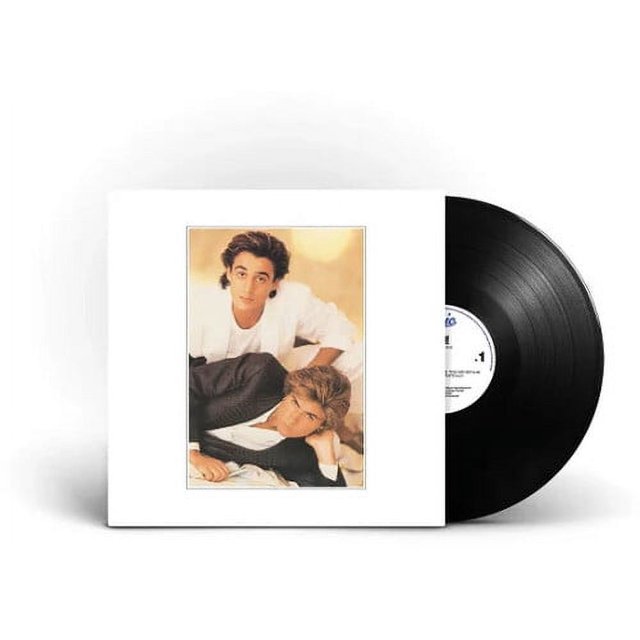Make It Big - Vinyle Noir Remasterisé par Sony UK. Cette Édition Remasterisée de l'Album Emblématique de Wham! de 1984 Présente des singles à Succès comme « Wake Me Up Before You Go-Go », « Everything She Wants », « Freedom » et « Careless Whisper. » la Pochette de l'Album Affiche une image Classique du duo, et le Disque Vinyle Noir Est Partiellement visible à Côté de la Pochette. un Pressage Limité, Nouvellement Masterisé pour le Vinyle, Disponible pour la Première Fois en Plus