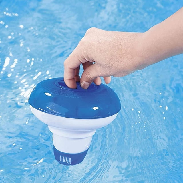 Herrnalise 1PC Floating Chlorine Dispenser for pools, spas, and hot tubs, shown in a hand for size reference. The blue and white dispenser floats on water and features a twist-lock cap and adjustable flow ring for controlled chlorine or bromine release. Made of durable ABS plastic, it holds 1-inch tablets and is suitable for above-ground pools, fountains, and aquariums.