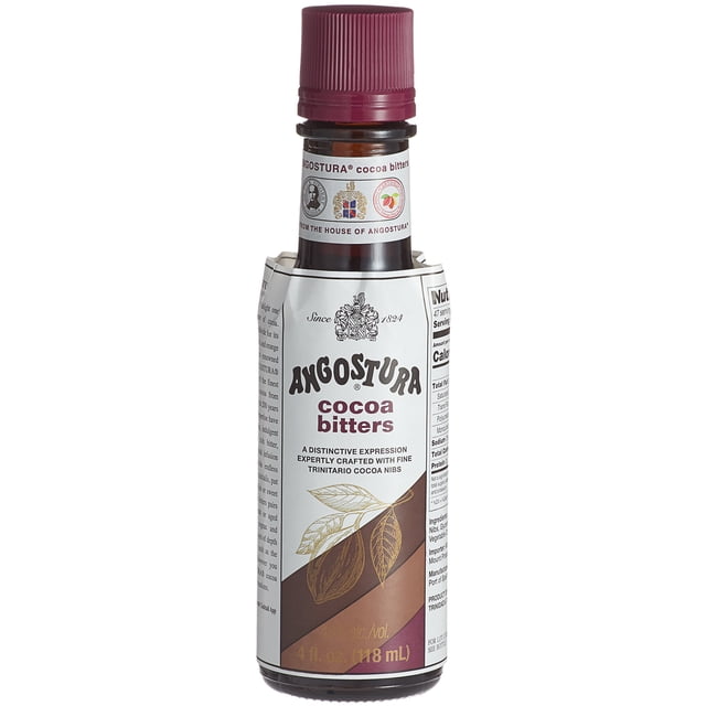 Angostura Bouteille en Verre Brun Foncé de 4 fl oz d'Amertumes de Cacao avec Bouchon Bordeaux et Étiquette Blanche Surdimensionnée Présentant des illustrations de Plumes de Cacao et des Détails du Produit. Faite avec des Plumes de Cacao Trinitario de Trinité-et-Tobago, Elle Offre une Riche Saveur de Cacao aux Notes Épicées et Florales. Idéale pour Rehausser des cocktails comme Old Fashioned, Manhattan et espresso martinis, Ainsi Que des applications Culinaires comme les sauces et les