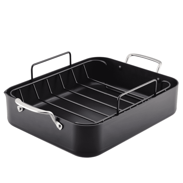 KitchenAid Hard Anodized Roaster with Removable Nonstick Rack, 13-Inch x 15.75-Inch, Matte Black. A durable hard-anodized aluminum roasting pan with a matte black finish, featuring a removable nonstick rack for even heat circulation and easy food release. Includes stainless steel handles, a built-in corner spout for pouring, and is oven safe up to 500°F. Suitable for roasting meats or preparing stovetop sauces and gravies.
