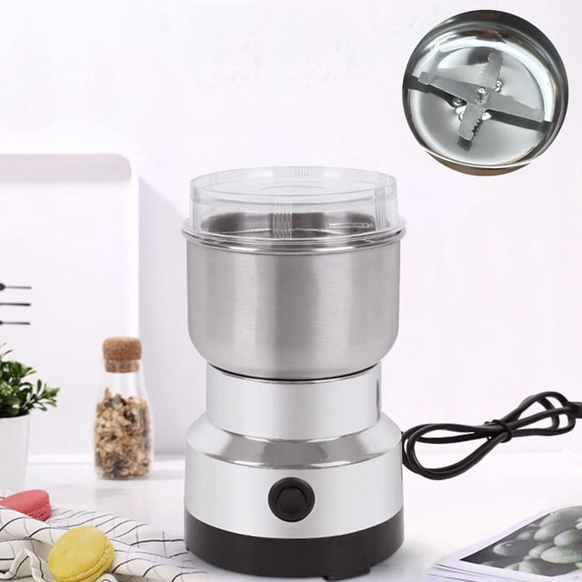 EGNMCR Home and Kitchen Standard Grinder CoffeeGrinder Coffee Machine made of stainless steel, featuring a compact design with a transparent lid, sturdy black base, and four steel blades for efficient grinding. Ideal for coffee, spices, and more, it measures 17x10.5x10.5 cm and is shown in a kitchen setting with a power cord visible.