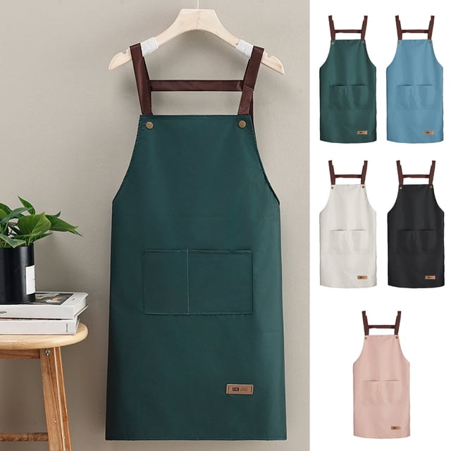 PVC kitchen apron with phone pocket, shown in a green color with brown H-strap design. The apron is waterproof, oil-resistant, and machine washable, measuring 85x65cm (33.4x25.5in). It features a front pocket for convenience and is ideal for cooking, baking, and kitchen work. Multiple color options are displayed, including black, white, blue, and pink.