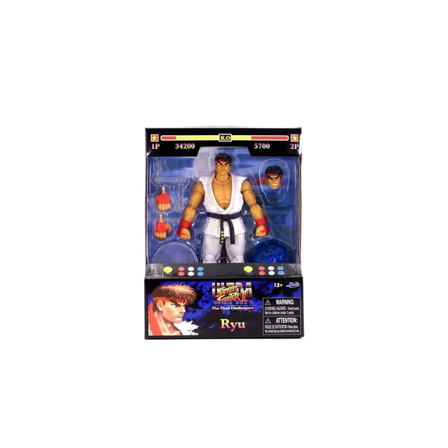 Jada Toys STREET FIGHTER II ACTION FIGURE - RYU (WAVE 1) is a 6-inch articulated figure of Ryu in a white gi with black belt and red wristbands, including alternate hands, an extra head, and a blue Hadoken fireball accessory, packaged in arcade-style box with game score graphics, ideal for collectors and battling toy enthusiasts.