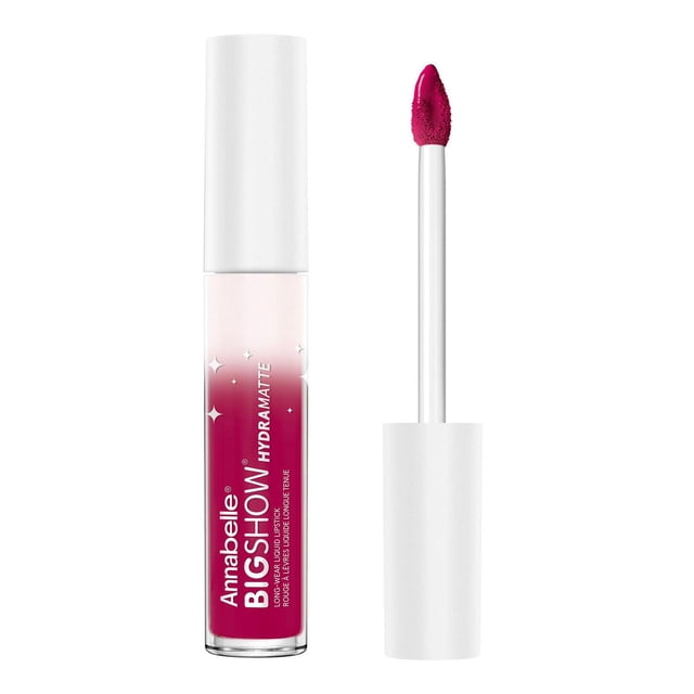 Annabelle Bigshow Hydramatte Liquid Lipstick in a clear tube with white cap showing a rich berry shade, next to a white doe-foot applicator wand coated with the same pigment, delivering a lightweight, hydrating matte finish with long wear and high coverage.