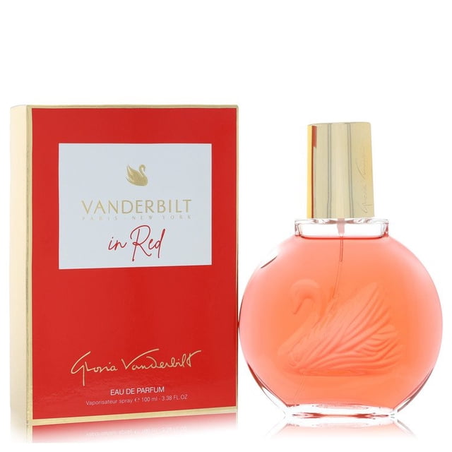 Gloria Vanderbilt In Red by Gloria Vanderbilt Eau De Parfum Spray 3.38 oz for Women. The image displays a round, red-tinted perfume bottle with an embossed swan design and a gold cap, accompanied by its red and gold packaging. This floral fragrance combines rose, woody, spicy, vanilla, fruity, sweet, musky, and powdery notes, providing a refreshing and long-lasting scent.