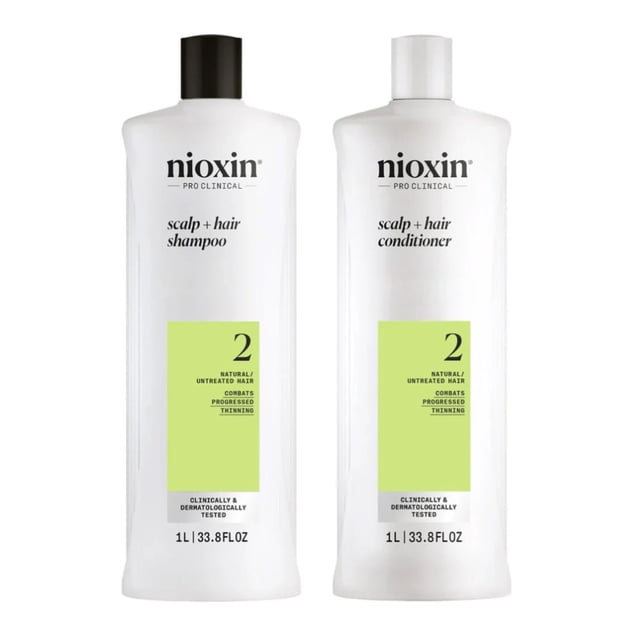 Nioxin System 2 Duo Shampooing et Revitalisant 1 L Comprenant Deux Bouteilles Blanches avec Étiquettes Vertes. Conçu pour des Cheveux Naturels Non Traités avec une Clairsemence Progressive, Cet Ensemble Comprend un Shampooing de 33,8 fl oz et un Revitalisant de 33,8 fl oz. Convient au Traitement de la Clairsemence des Cheveux et aux Soins de la Pousse.