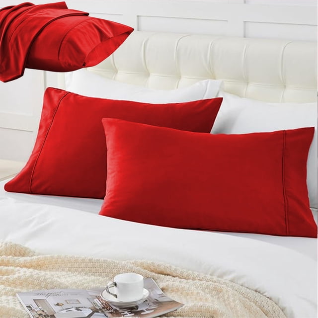 LSLJS Medium Cool Pillowcase in red, made of soft brushed polyester fabric, shown on a bed with white bedding. The pillowcase features an envelope-style closure for easy use and measures 20x26 inches (66x51 cm). Designed for sound sleepers, it is breathable, machine washable, and suitable for year-round comfort.