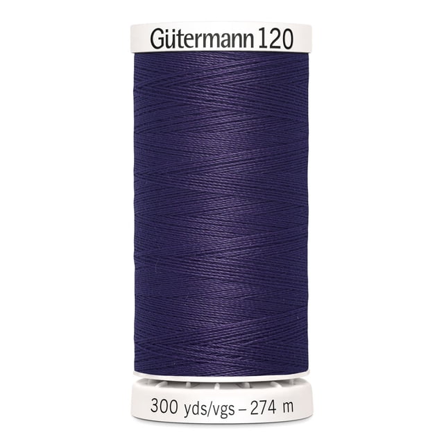 Gutermann 120 100% polyester all purpose thread spool in dark navy blue tightly wound on a white plastic spool labeled with brand and length of 300 yards (274 meters), ideal for machine and hand sewing woven, knit, and synthetic fabrics including craft and mending projects.