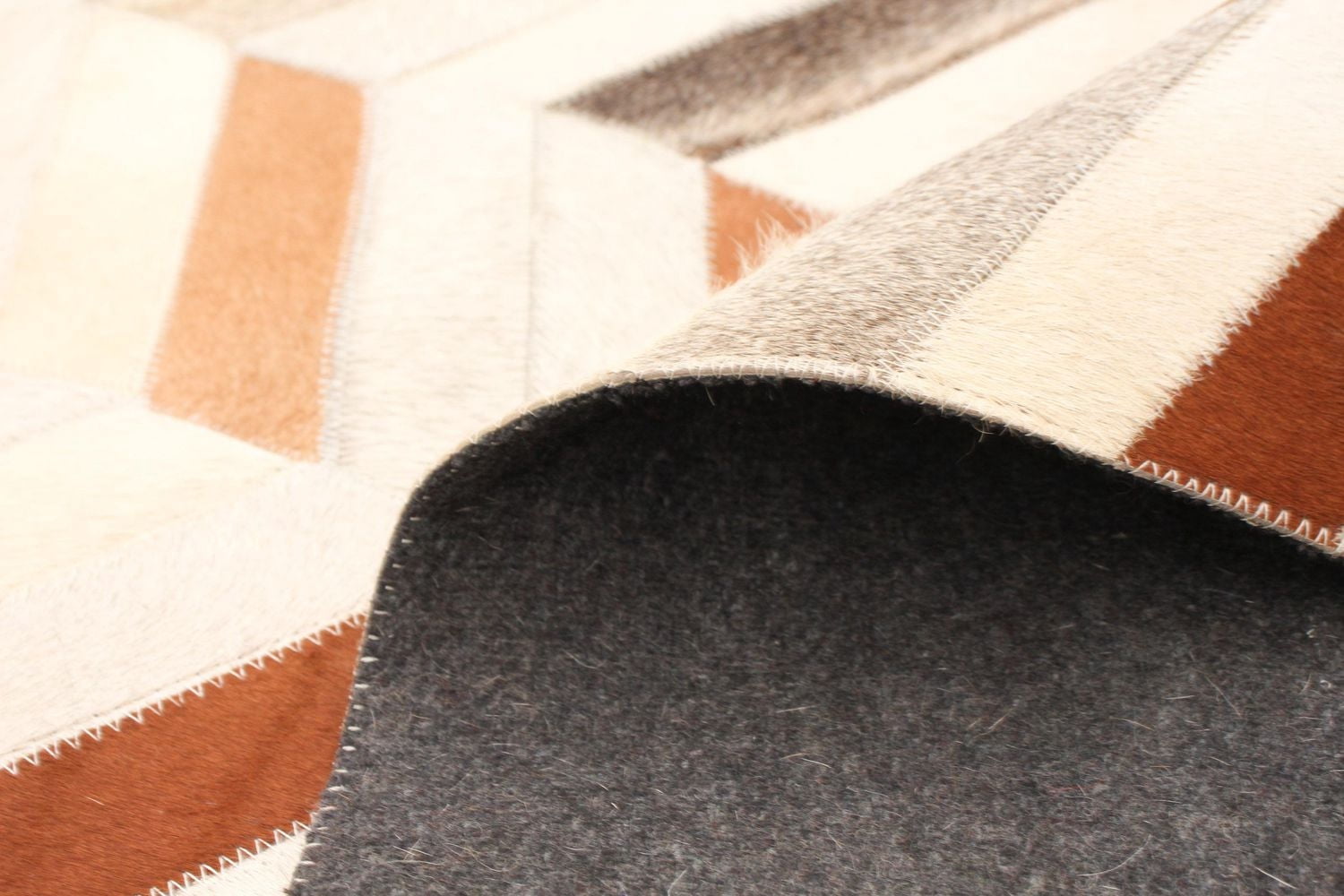 ECARPETGALLERY 4'8" x 6'7" Contemporary Cowhide Patchwork Handmade Area Rug for Living Room, Dining Room and Bedroom Brown
