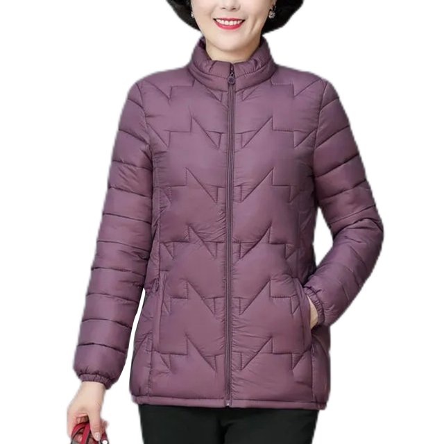 MAWCLOS Ladies Lightweight Solid Color Puffer Coats Winter With Pockets Down Jackets in purple, size 3XL. This women's winter coat features a stand collar, long sleeves, and a hip-length design. Made from 100% polyester, it has a front zipper closure, elasticized cuffs, and two side pockets for convenience. The solid color and lightweight material make it suitable for casual outings, traveling, or everyday wear during autumn and winter.