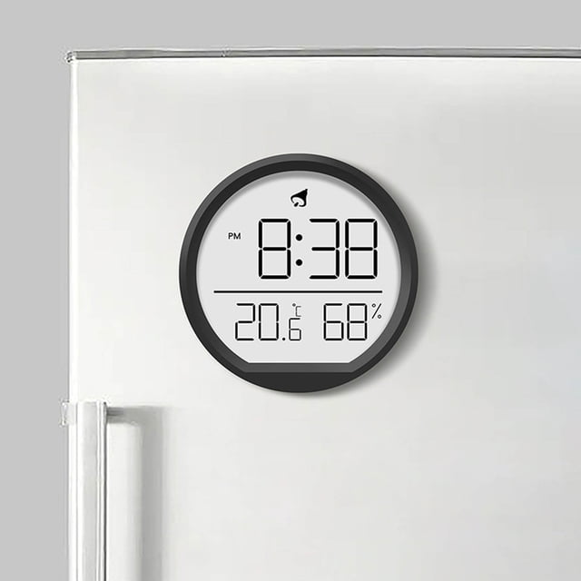 EGNMCR Alarm Clock Wall Clock Temperature And Humidity Meter Clock featuring a digital display with time, temperature, and humidity readings. The clock is wall-mounted with a sleek black circular frame, shown attached to a white surface. It displays 8:38 PM, 20.6°C, and 68% humidity, offering silent operation and a modern design suitable for home or kitchen use.