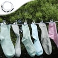 thumbnail image 1 of TACILIP Organisateurs et Rangement de Garde-Robe, Corde à Linge Coupe-Vent Rétractable avec Boucle Fixe, Corde à Linge de Voyage Pratique avec Pinces 12 Pinces à Linge 70,87 Po, Cadeaux de Pendaison de Crémaillère, 1 of 6