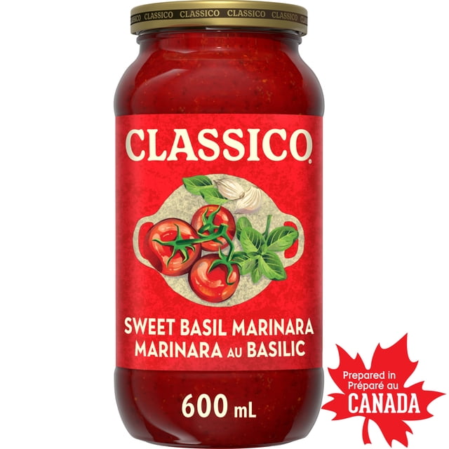 Classico Sweet Basil Marinara Pasta Sauce in a 600 mL clear glass jar with a gold lid, featuring a red label with illustrations of vine-ripened tomatoes, garlic, and basil leaves, prepared in Canada.