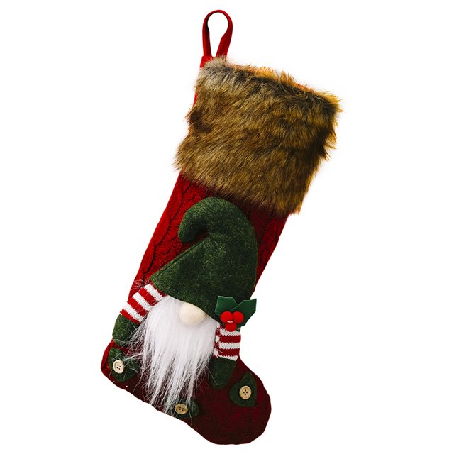 Coofit Fireplace Hanging Stocking 3D Gnome Xmas Stocking in red, green, and white. Made of non-woven material and faux fur, this Christmas stocking features a whimsical gnome design with a green hat, striped red and white sleeves, and button details. The stocking measures 22x43cm (8.66x16.93in) and includes a faux fur cuff and a red hanging loop. Suitable for use as a gift bag, tree ornament, or fireplace decoration during Christmas, New Year, and other holidays.