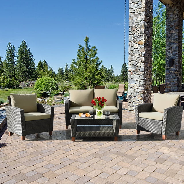 Gymax 4PCS Cushioned Rattan Conversation Set with Coffee Table for patio or outdoor use. Includes a loveseat, two single chairs, and a coffee table with tempered glass and a lower storage shelf. Made of durable steel and hand-woven rattan with beige cushions for comfort. Suitable for gardens, patios, and poolside settings.