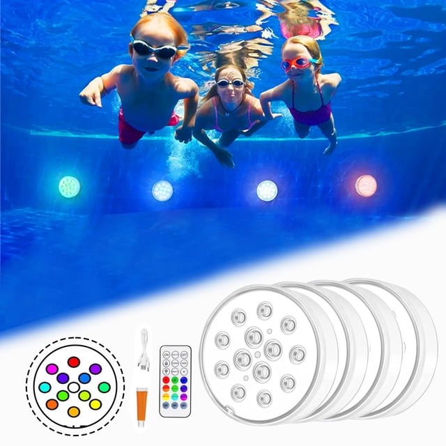 TIMIFIS Lumière de Piscine Recharge Usb Led13 Lumières RVB à Changement de Couleur Télécommande Rf Lumières de Plongée Minuterie Lumières de Fond de Piscine 20 ml Natation. l'Image Affiche Quatre Lumières DEL sous-Marines avec 13 DEL à Changement de Couleur RVB, Installées dans une Piscine. les Lumières Sont Accompagnées d'Une Télécommande Rf, d'Un Adhésif et d'Un Câble de Chargement Usb, Toutes Indiquées au Premier Plan. Ces Lumières IP68 Étanches Sont Rechargeables avec une Batterie de 2600 mAh, Offrant jusqu'à 160 Heures d'Éclairage. Convient aux Piscines,