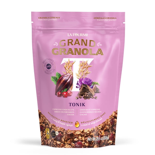 La Fourmi Grand Granola Tonik in an 808g resealable pink pouch. The packaging highlights its espresso chocolate flavor with dried cranberries, cocoa, and organic ingredients. Certified organic, kosher dairy, non-GMO, and made in Canada with 79% locally sourced ingredients. Contains 5g of protein, high fiber, and low sodium per serving. Suitable for breakfast with milk or yogurt, as a topping, or as a snack.