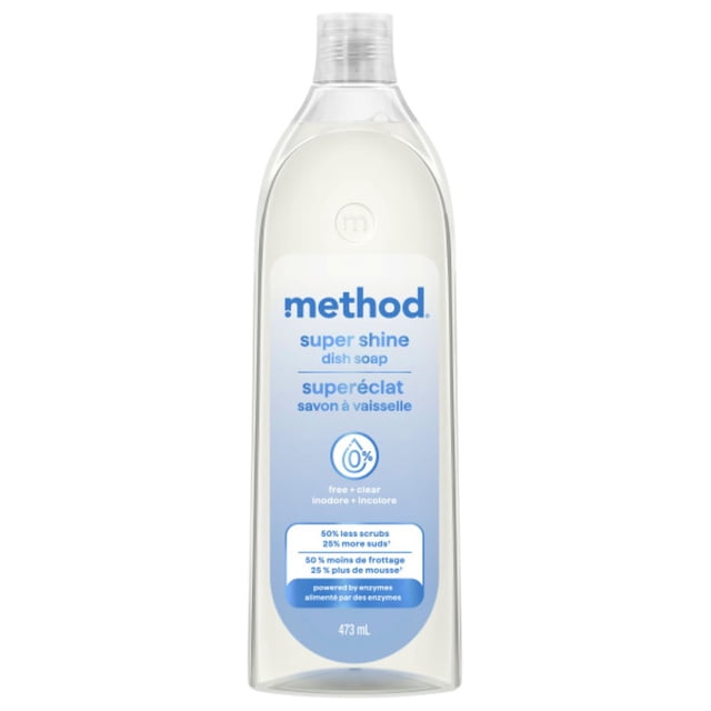 Method Super Shine Liquid Dish Soap Free and Clear 473 ml clear plastic bottle with transparent liquid and blue-white label highlighting 0% fragrance and dye, enzyme-powered grease removal, 50% less scrubbing, and 25% more suds for effective dishwashing.