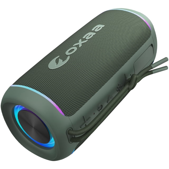 OXAA VibeOX Haut-Parleur Bluetooth Mini 16W avec design Cylindrique compact, Extérieur Texturé Vert et accents d'Éclairage RVB Vibrants. Cet Appareil audio portable Offre un Son 16W Puissant avec des Aigus Nets et des Basses Profondes, Parfait pour les Voyages, les Rassemblements en Plein Air Ou la Maison. Caractéristiques Incluant une Durabilité IP67 Étanche et Antipoussière, Connectivité Bluetooth, Entrées USB et Carte microSD, et jusqu'à 10 Heures de Lecture. Léger et Prêt pour le Voyage, Il Comprend une Sangle de Transport Robuste pour une