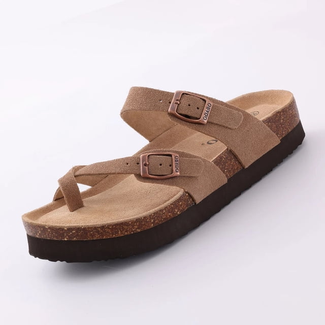Comwarm Fashion Mules And Clogs For Women Men Slip-on Cork Footbed Slippers Summer Beach Sandals with arch support. Tan suede-like upper with adjustable metal buckle straps, cork insole, and deep heel cups for comfort. Lightweight, non-slip outsole ideal for summer footwear and casual beach outings.