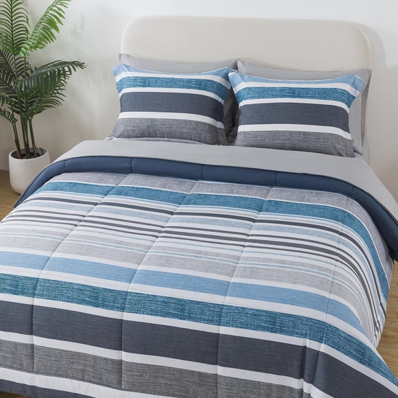 Ensemble tout-en-un réversible Mainstays comprenant une couette et des draps, 7 pièces, à rayures bleues, format très grand lit (King).
