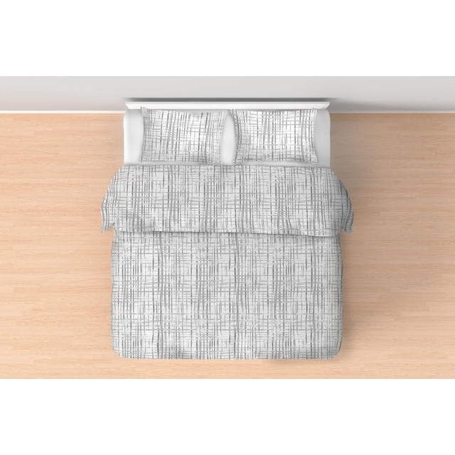 Johnson Home 160 GSM Comforter Sets with a top-down view of a bed dressed in a white comforter and matching pillow shams featuring a grey linear grid pattern, crafted from soft brushed flannel cotton, suitable for enhancing bedroom bedding and decor on a light wood floor.
