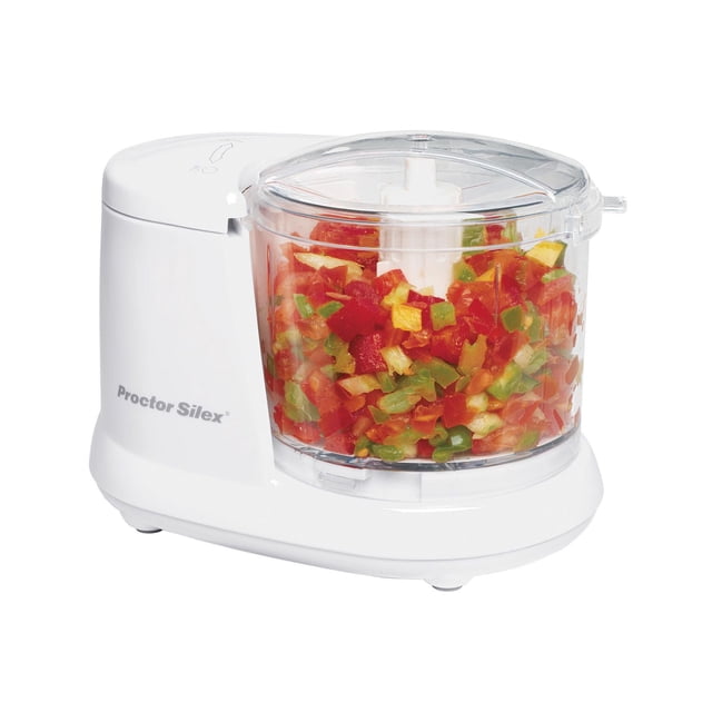 Proctor Silex 1.5-Cup Food Chopper 72500G with white base and clear plastic bowl filled with chopped red, green, and yellow vegetables, featuring stainless steel blades and a transparent lid, suitable for efficient kitchen food prep.