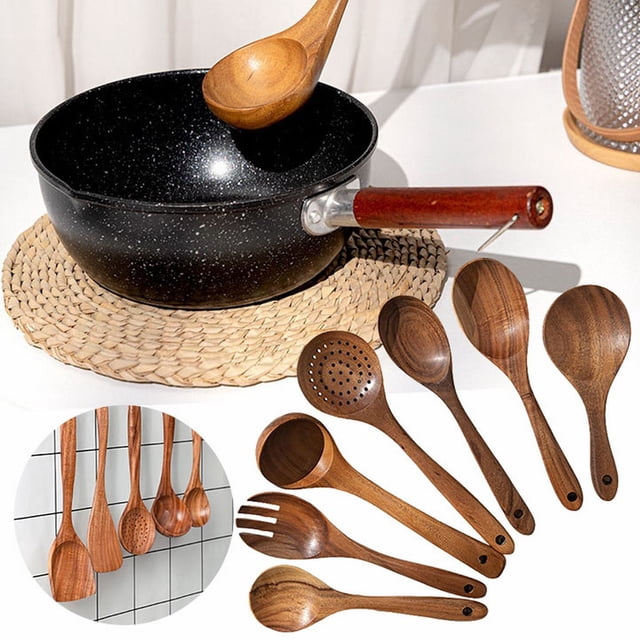 Tableware 7Pcs Teak Wood Kitchen Utensils Set made from durable, heat-resistant natural teak wood. Includes ergonomic spatulas and spoons for nonstick cooking, stirring, and mixing. Displayed with a black nonstick pan on a woven mat, highlighting their sturdy construction and versatile use.