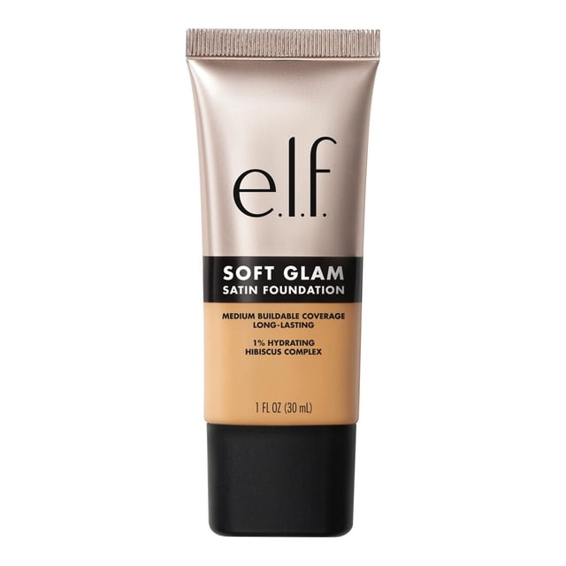 e.l.f. Cosmetics Soft Glam Satin Foundation in a 30 ml beige tube with matte black cap, offering medium buildable coverage and a breathable, long-lasting satin finish. Infused with 1% hydrating hibiscus complex and fruit extracts, this liquid foundation is non-comedogenic and suitable for dry, oily, and combination skin.