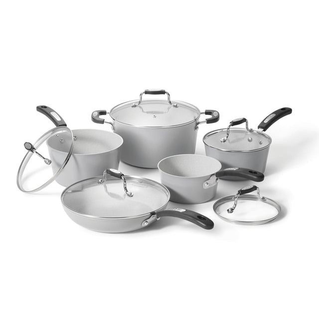 Starfrit The Rock Terra 10-piece cookware set in grey featuring ceramic non-stick Rock.Tec surface and thick aluminum base, including saucepans, stockpot, and fry pan with tempered glass lids, oven and dishwasher safe, PFAS-free for healthier cooking.