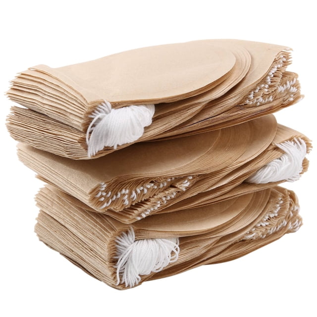 300PCS Tea Filter Bags, Disposable Tea Filter Bags Paper Tea Infuser Drawstring Empty Tea Bags for Loose Tea and Coffee Pack of 300 unbranded round drawstring filter bags (75 mm) made from unbleached wood-pulp filter paper in log colour; close, centered view shows pleated sides, knotted drawstring and one open bag with loose tea to show easy filling and brew separation, also suitable for coffee grounds, herbs or single-serve soup sachets.
