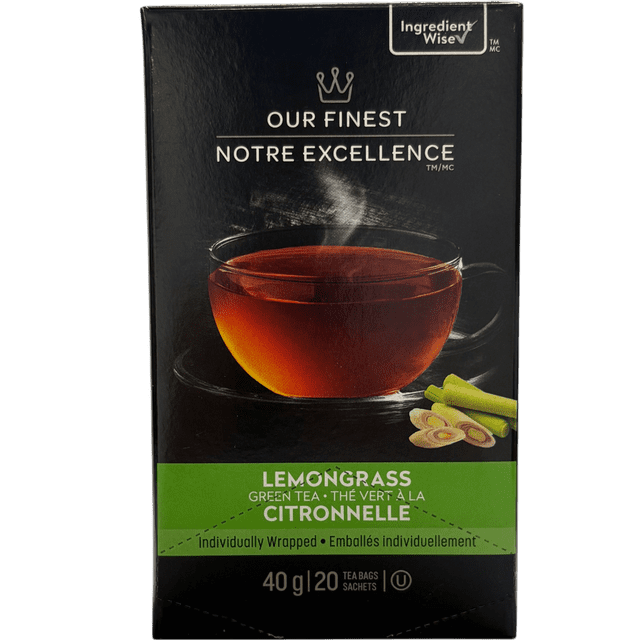 Our Finest Lemongrass Green Tea box showing a steaming glass cup of amber green tea with fresh lemongrass stalks and slices on a black background, containing 20 individually wrapped tea bags weighing 40 g, often used for calming herbal infusions.