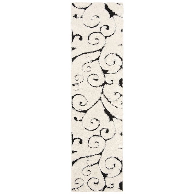 SAFAVIEH Florida Douglas Floral Vines Shag Area Rug with plush high-low pile in crème tone featuring black damask vine swirls, power-loomed synthetic yarn construction for durability, ideal for textured floor accents and suitable as a soft hallway runner.